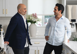 Two Aficio22 Co-Founders standing in a white kitchen